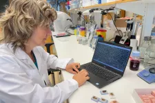 Photo of a researcher in the lab. 