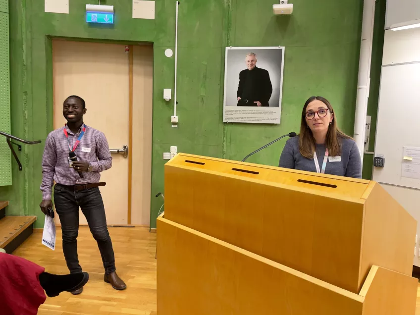 Photograph of early career researchers at a lecture.