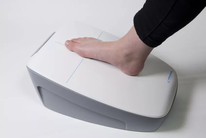 foot on a vibrometer